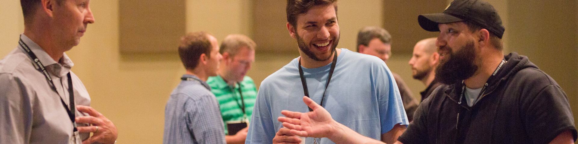 Men Talking at Event