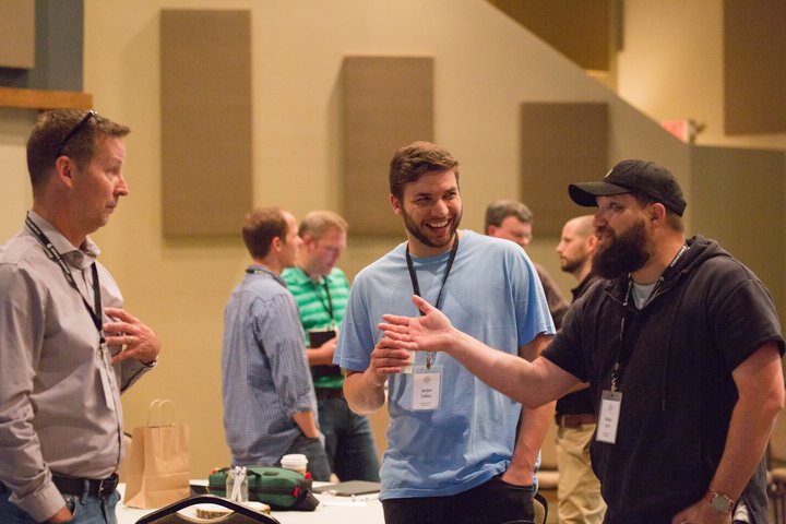 Men Talking at Event