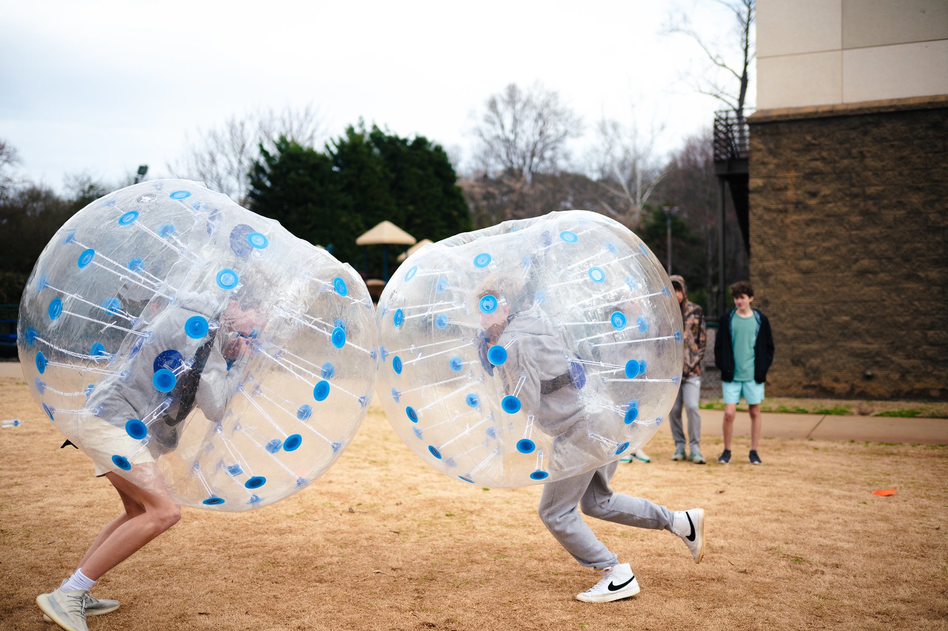 students winter weekend boys in bubbles