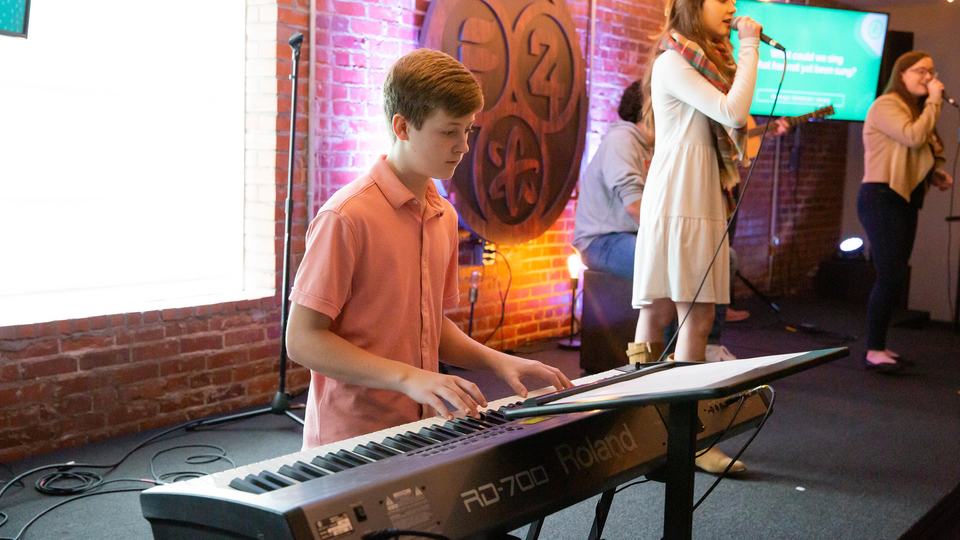 Student playing keys