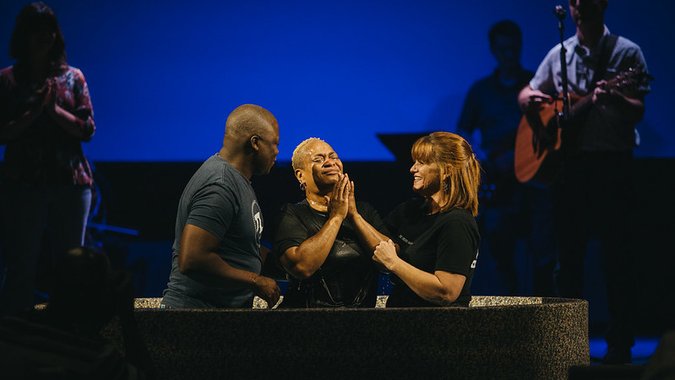 Woman being baptized