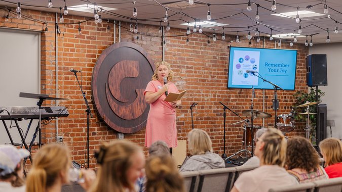 Woman speaking at Remember Your Joy study