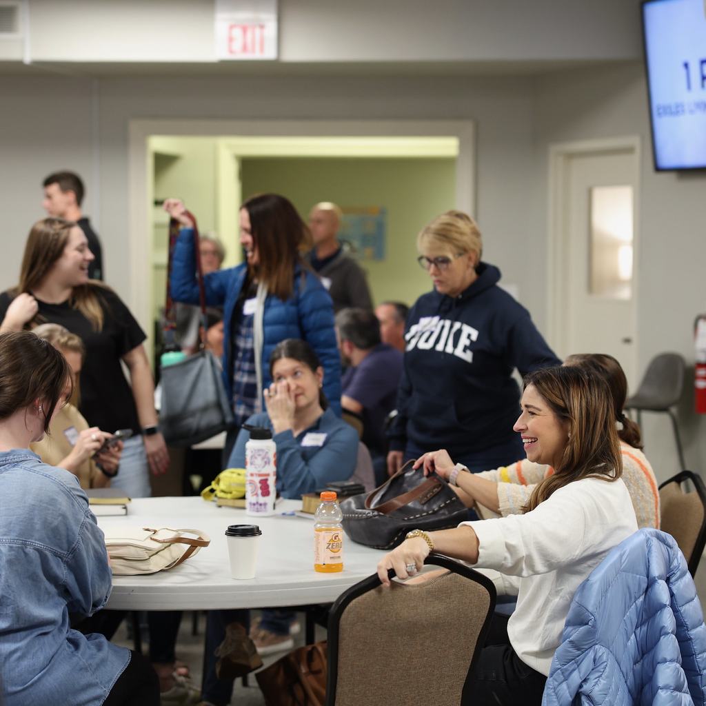 1 Peter study participants gathering at tables