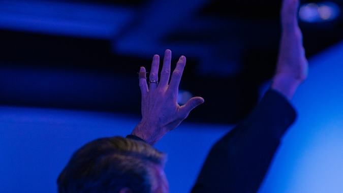 Man raising hands in worship