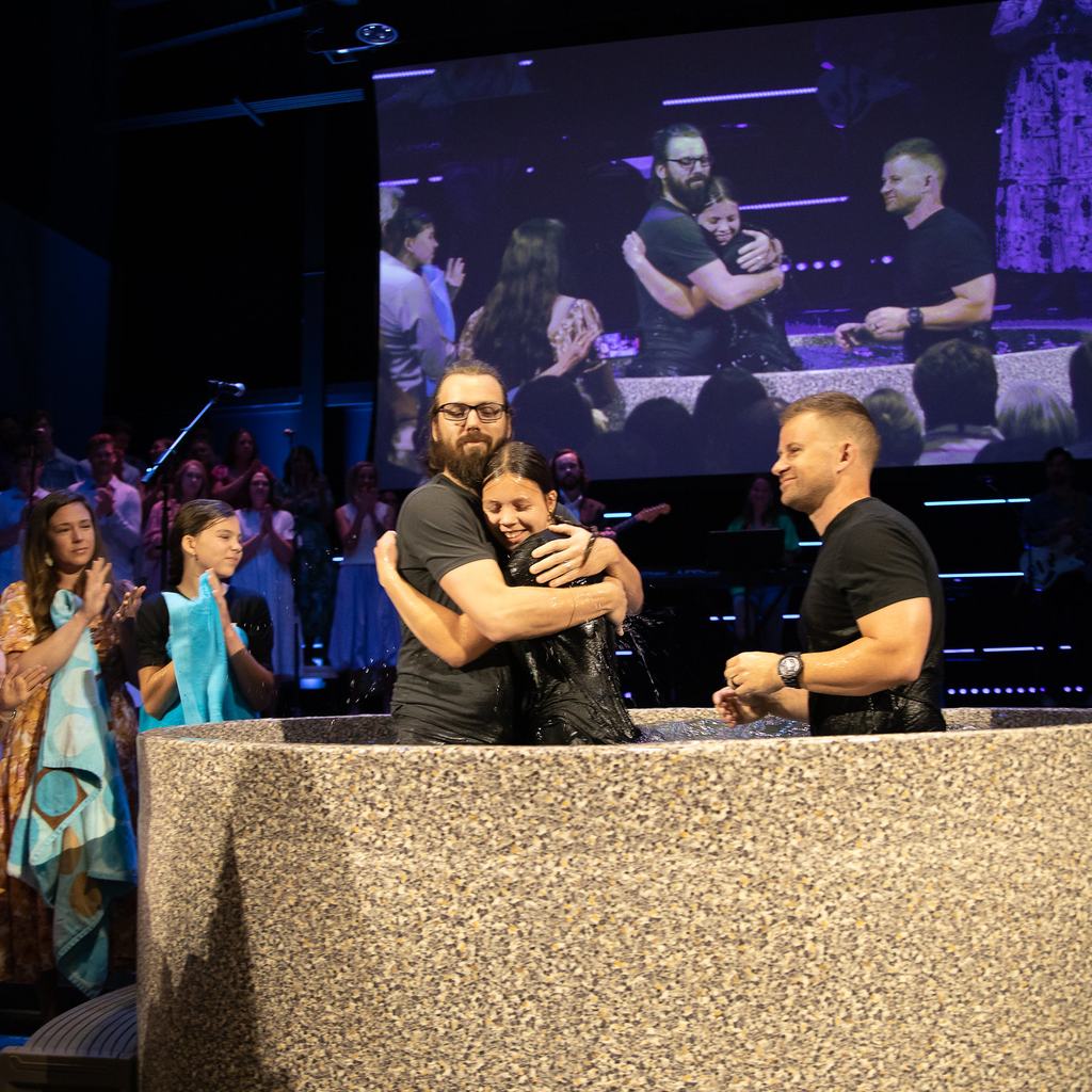 Woman being baptized