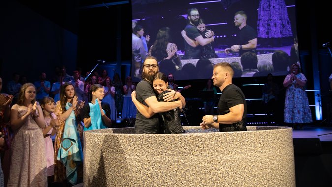Woman being baptized