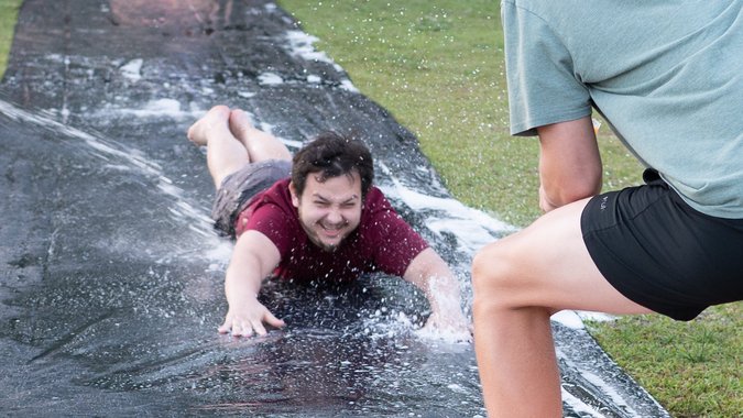 Students on slip and slide