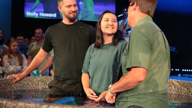 Woman being baptized