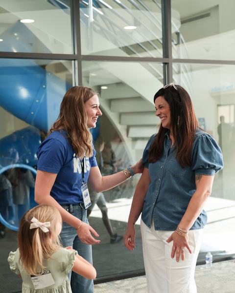 Women laughing in lobby