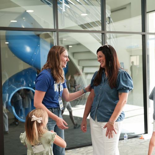 Women laughing in lobby