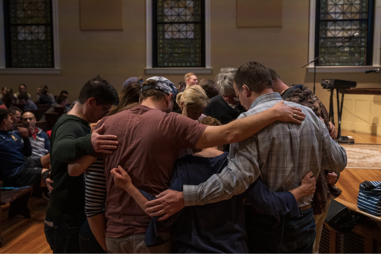 Group Praying in a Circle