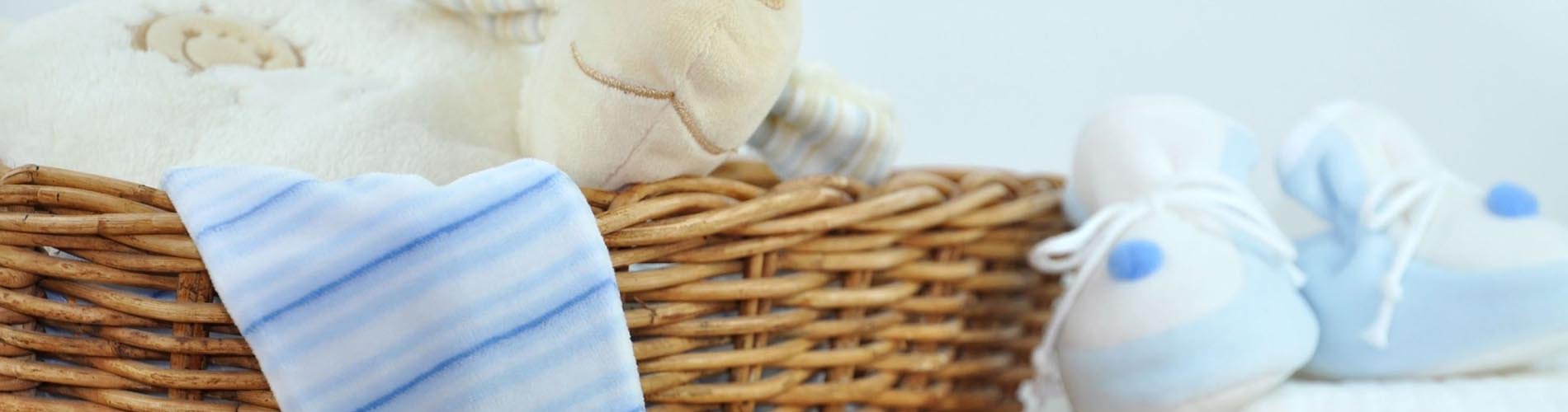 Baby Bear and Blanket in Basket next to Shoes