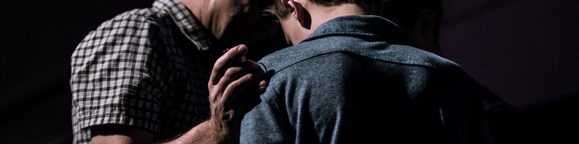 Two Men Praying Together