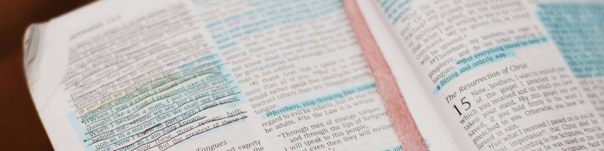 Open Bible with blue highlighted portions