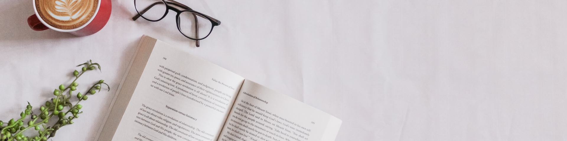 Open Book with Glasses and Coffee