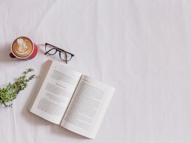 Open Book with Glasses and Coffee